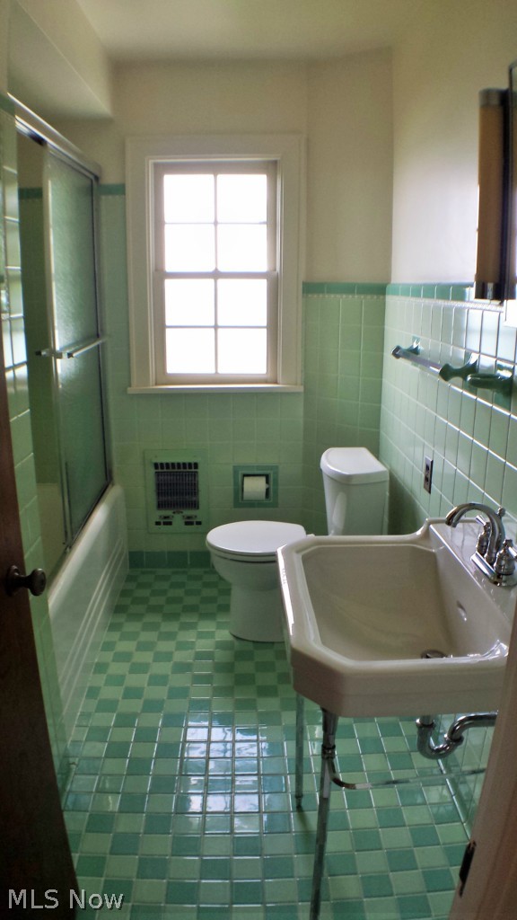 4567 Lake State Road Ashtabula, OH 44004 - Photo 24 of 25 Up bath with tile floor and walls