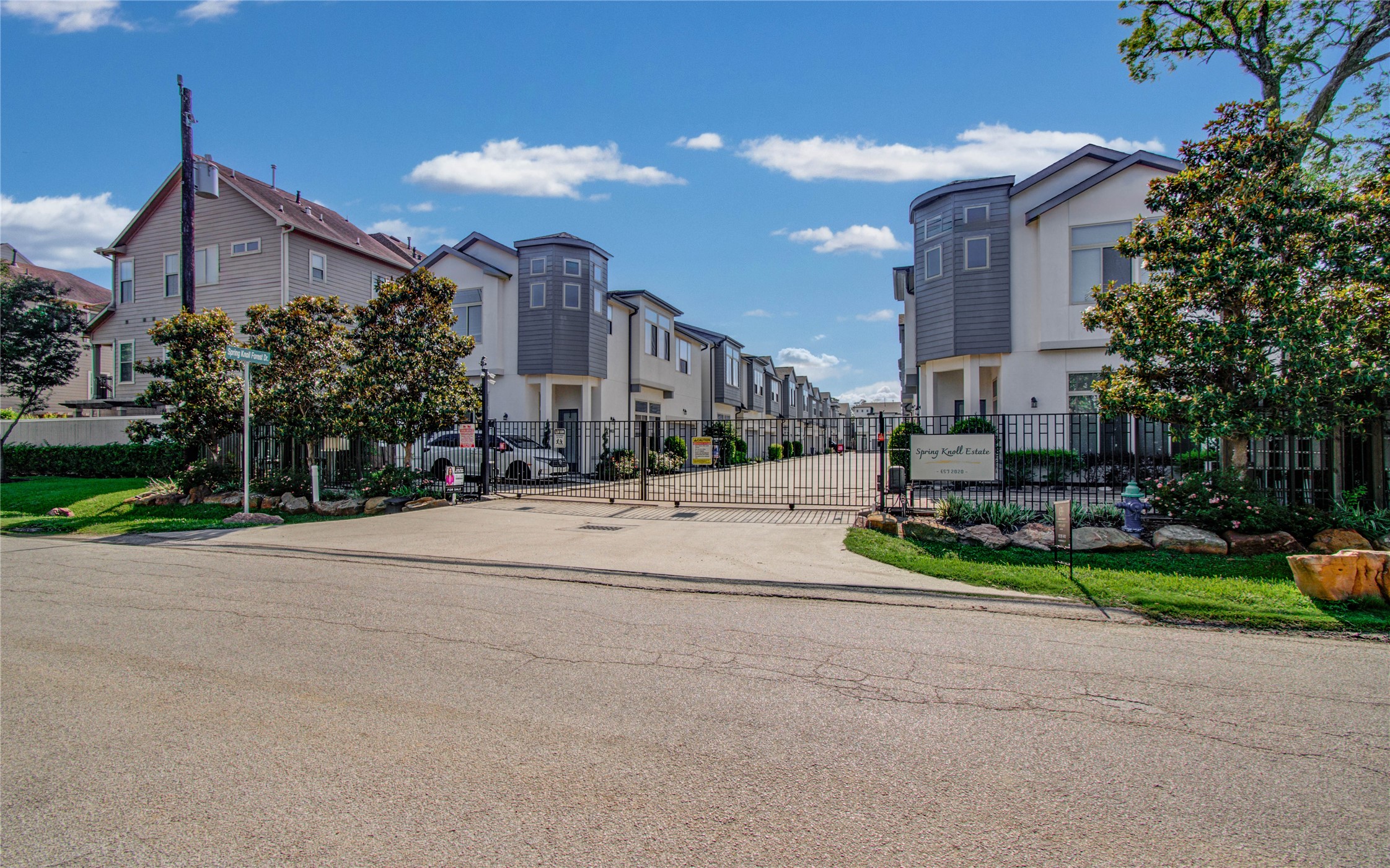 8903 Spring Knoll Forest Drive Houston, TX 77080 - Photo 29 of 29 a view of a street with a building in the background