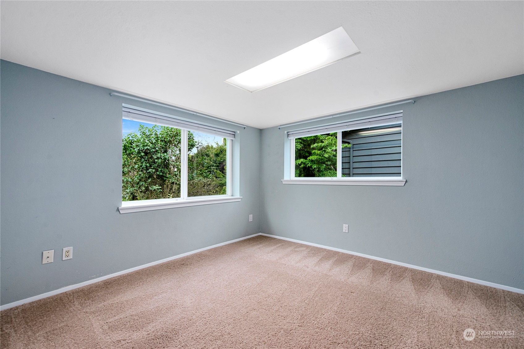10209 Northeast 198th Street Bothell, WA 98011 - Photo 19 of 28 a view of an empty room with a window