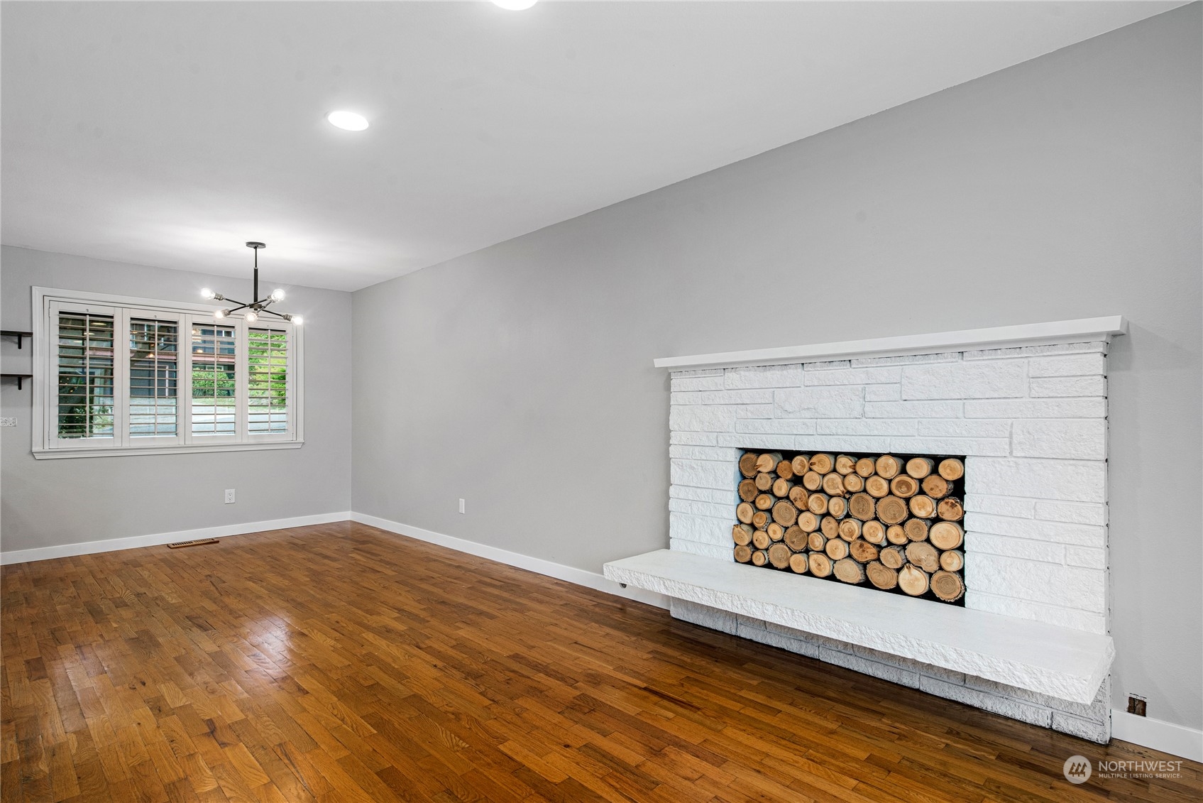 10209 Northeast 198th Street Bothell, WA 98011 - Photo 6 of 28 an empty room with windows