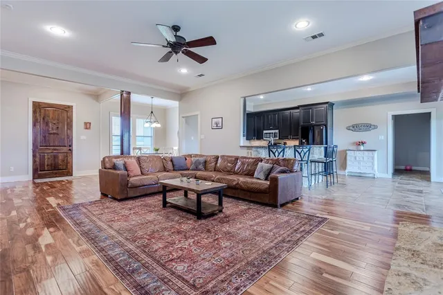 a living room with a couch and a fireplace