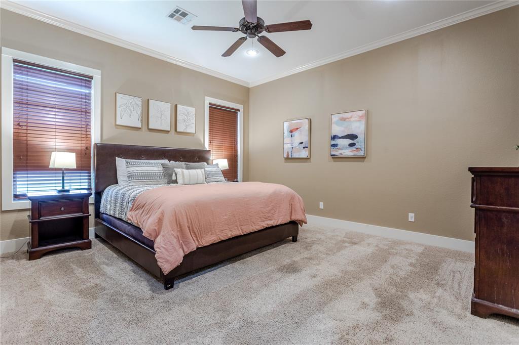 313 Wolf Creek Road Lorena, TX 76655 - Photo 20 of 39 a bedroom with a bed and window
