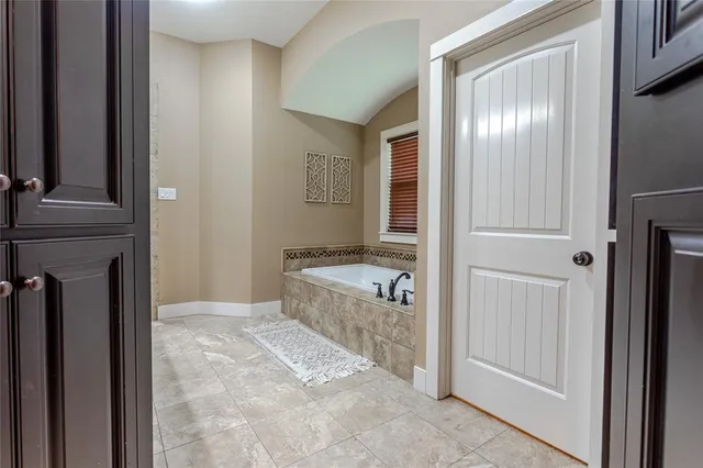 a bathroom with a sink double vanity and a mirror