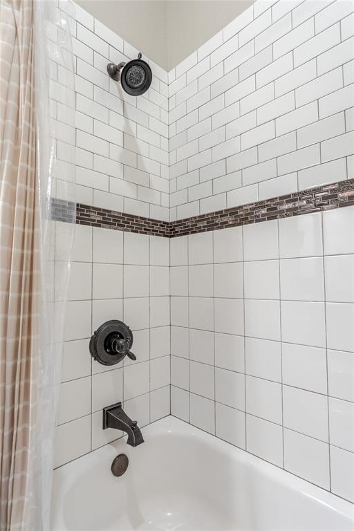 313 Wolf Creek Road Lorena, TX 76655 - Photo 28 of 39 a bathroom with a shower