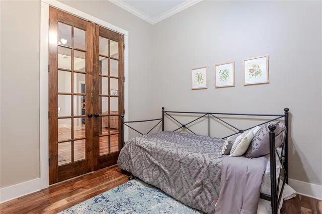 a bedroom with furniture and window