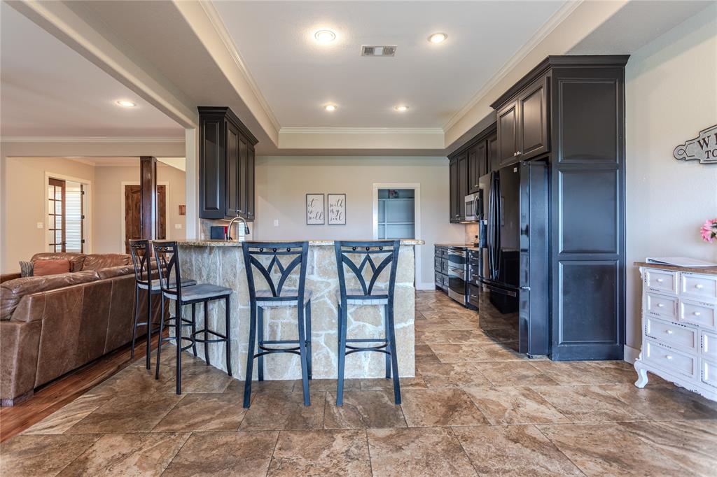 313 Wolf Creek Road Lorena, TX 76655 - Photo 39 of 39 a view of a dining area with furniture