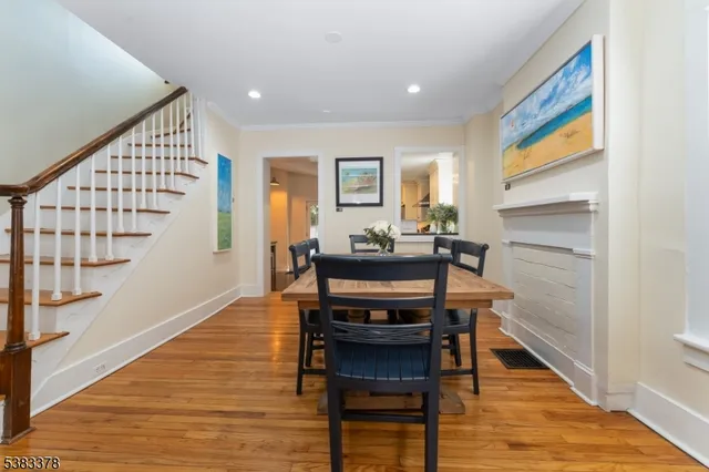 a view of a livingroom with furniture and wooden floor
