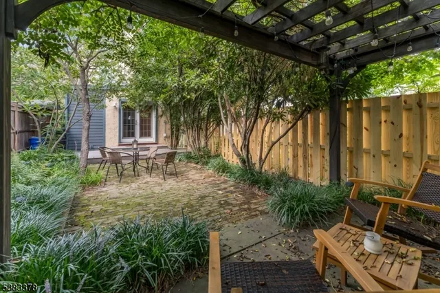 a backyard of a house with seating space