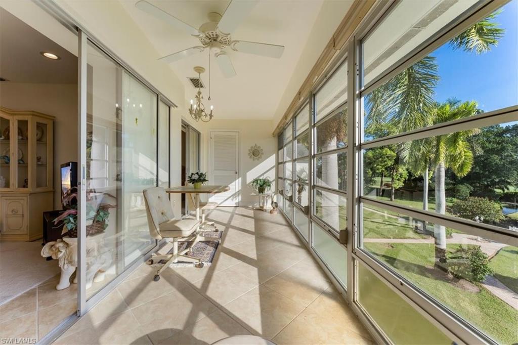 315 St Andrews Boulevard, Unit B32 Naples, FL 34113 - Photo 24 of 27 a view of an entryway with wooden floor
