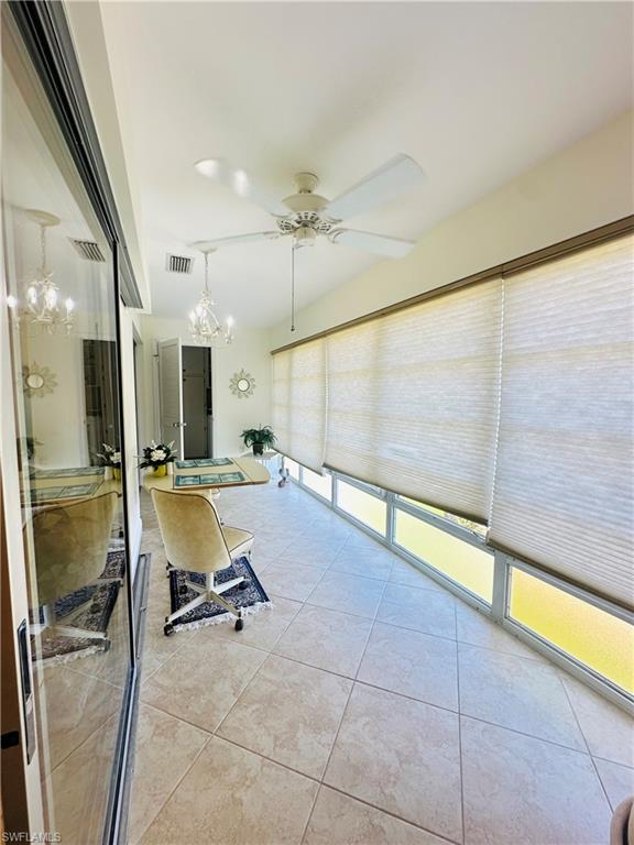 315 St Andrews Boulevard, Unit B32 Naples, FL 34113 - Photo 27 of 27 a room with gym equipment