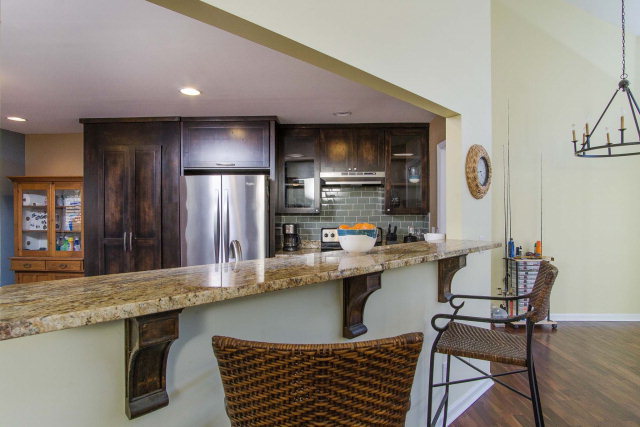 6415 Dobson Road Macon, GA 31220 - Photo 13 of 29 a kitchen with stainless steel appliances granite countertop a sink counter space and cabinets