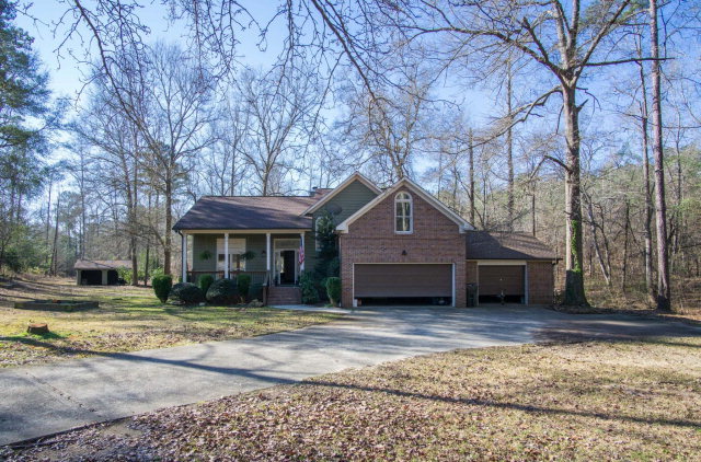 6415 Dobson Road Macon, GA 31220 - Photo 3 of 29 a front view of a house with a yard