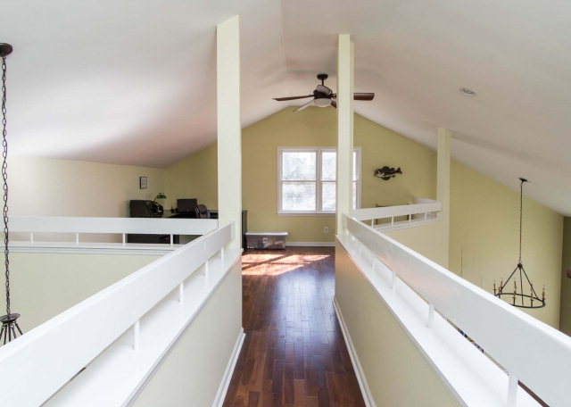6415 Dobson Road Macon, GA 31220 - Photo 23 of 29 a view of a kitchen with a sink and wooden floor