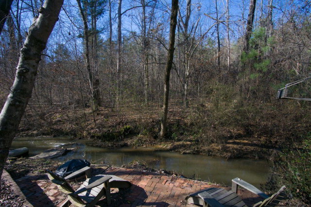6415 Dobson Road Macon, GA 31220 - Photo 5 of 29 an aerial view of a house with a lake view
