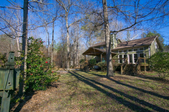 6415 Dobson Road Macon, GA 31220 - Photo 6 of 29 a front view of a house with a yard