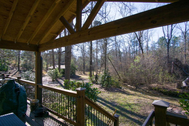 6415 Dobson Road Macon, GA 31220 - Photo 7 of 29 a view of a balcony with chairs and wooden floor