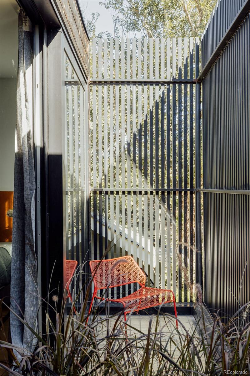 3837 High Street Denver, CO 80205 - Photo 20 of 46 a view of balcony with wooden floor