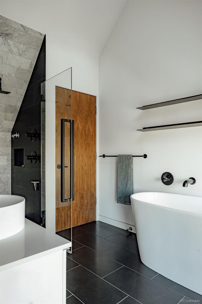 3837 High Street Denver, CO 80205 - Photo 37 of 46 a utility room with dryer and washer