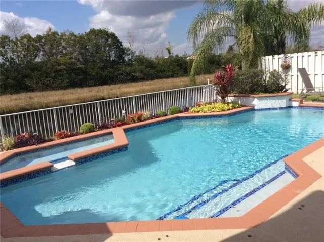 a view of swimming pool with lake view and mountain view