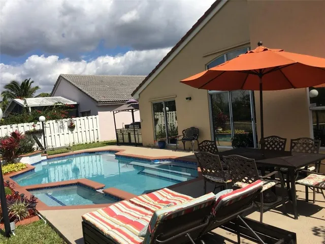 a outdoor space with patio lots of furniture