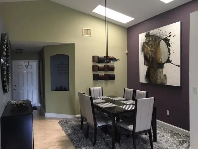 a view of a dining room with furniture