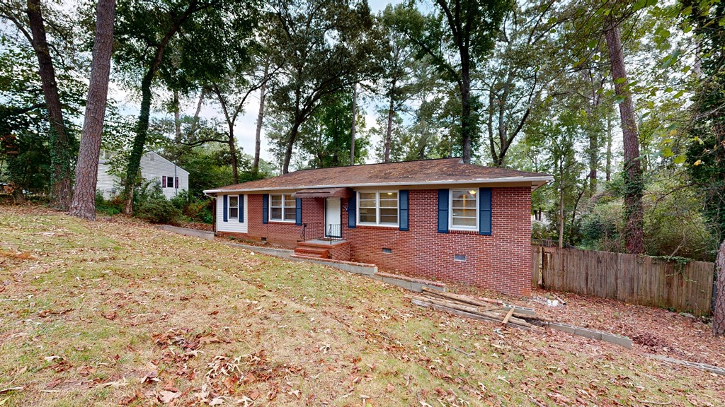 4320 Canady Street Columbus, GA 31909 - Photo 25 of 40 front view of a house with a yard