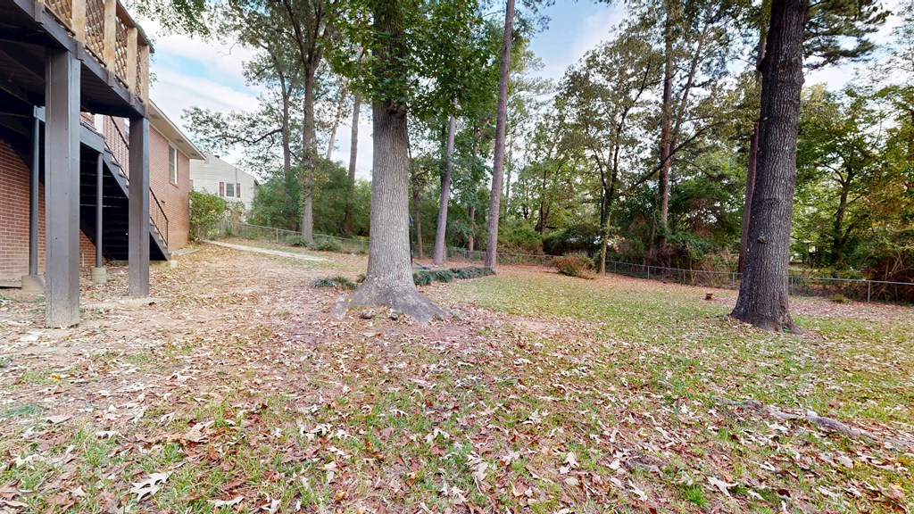 4320 Canady Street Columbus, GA 31909 - Photo 36 of 40 a backyard of a house with lots of green space