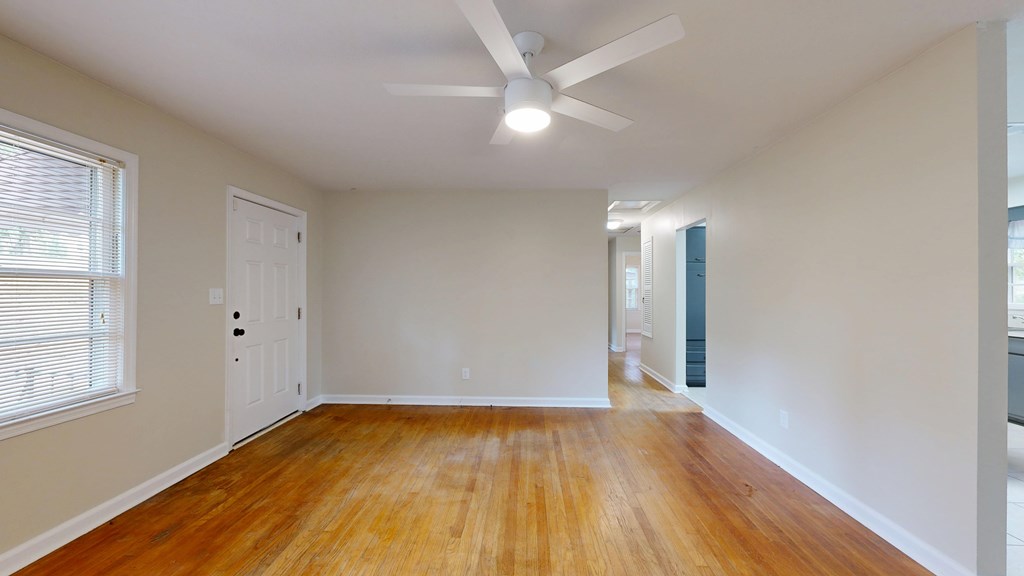 4320 Canady Street Columbus, GA 31909 - Photo 4 of 40 an empty room with wooden floor and windows