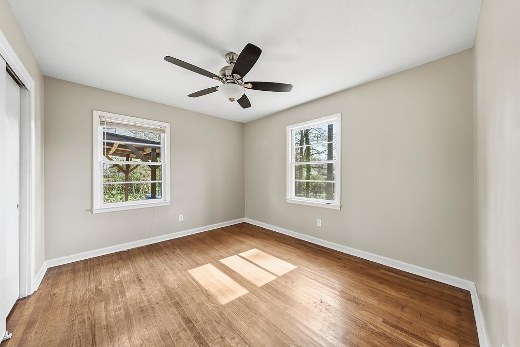 4320 Canady Street Columbus, GA 31909 - Photo 4 of 36 a view of empty room with wooden floor and fan