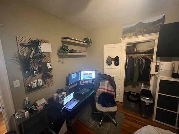 a view of a workspace with furniture