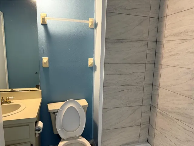 a bathroom with a sink and a toilet