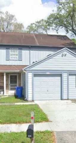 a front view of house with yard