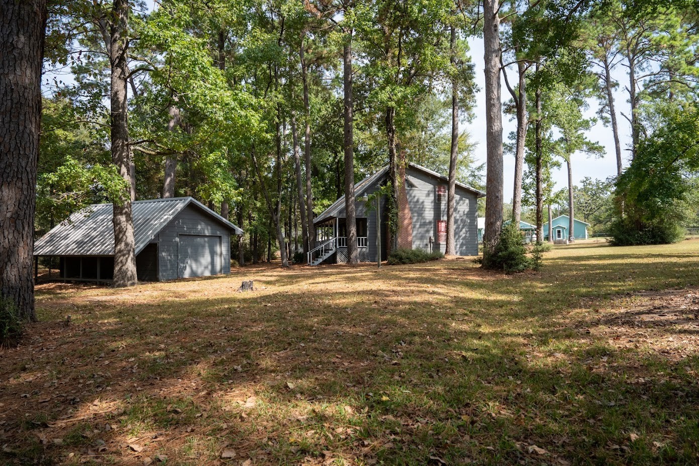 565 Timber Bay Drive Trinity, TX 75862 - Photo 41 of 49 a view of a house with yard and trees