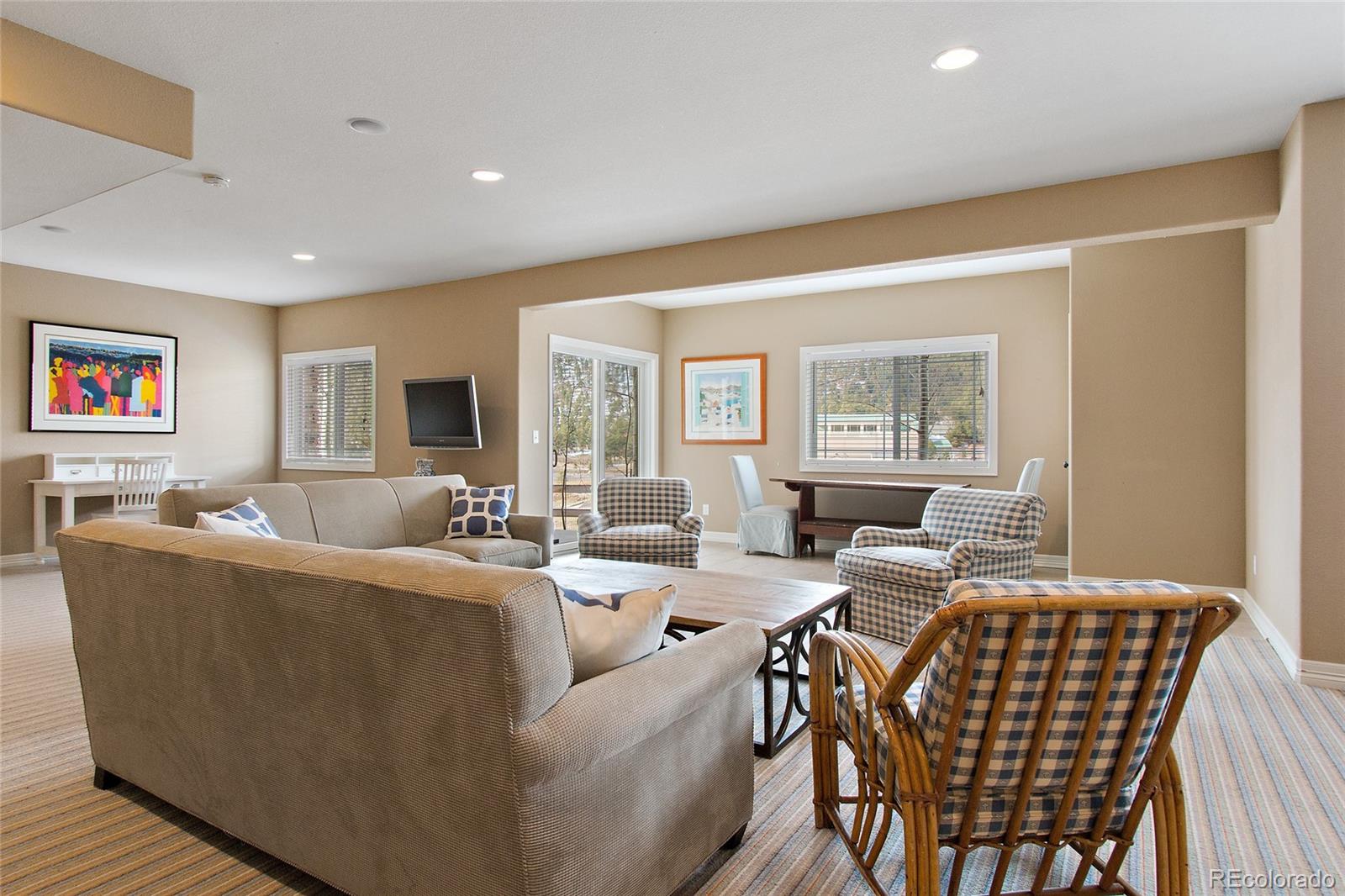 791 Elk Rest Road Evergreen, CO 80439 - Photo 28 of 35 a living room with furniture and a window