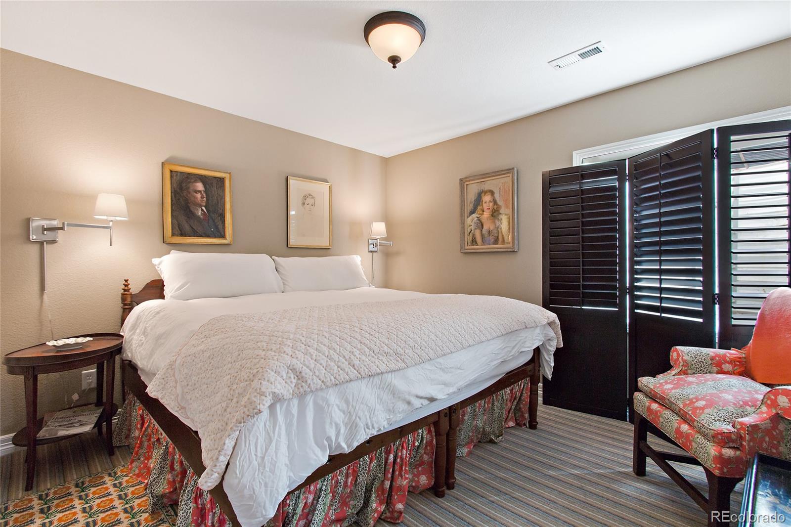 791 Elk Rest Road Evergreen, CO 80439 - Photo 31 of 35 a bedroom with a bed and a window