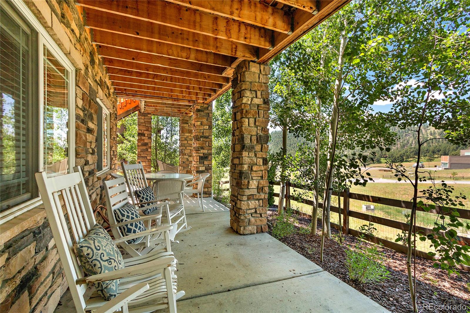 791 Elk Rest Road Evergreen, CO 80439 - Photo 33 of 35 a view of balcony with chairs