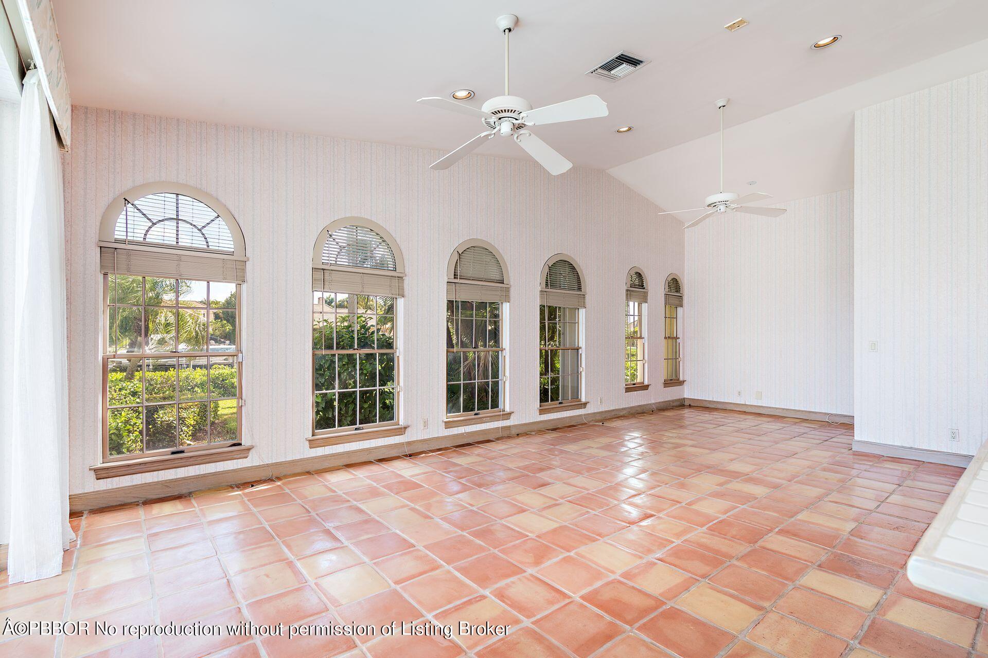 3299 Bridgegate Drive Jupiter, FL 33477 - Photo 13 of 48 a view of an empty room with a window