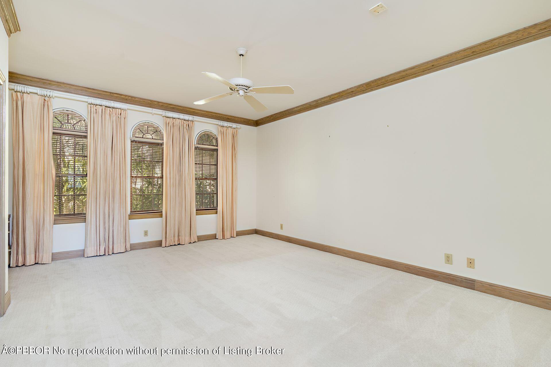 3299 Bridgegate Drive Jupiter, FL 33477 - Photo 20 of 48 a view of an empty room with a window