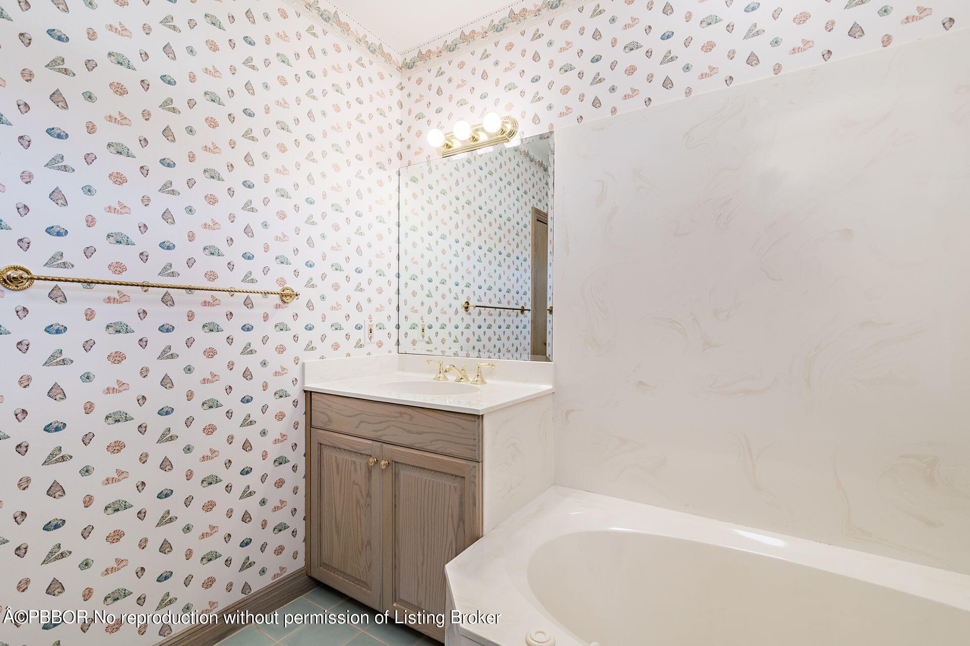 3299 Bridgegate Drive Jupiter, FL 33477 - Photo 25 of 48 a bathroom with a sink toilet and shower