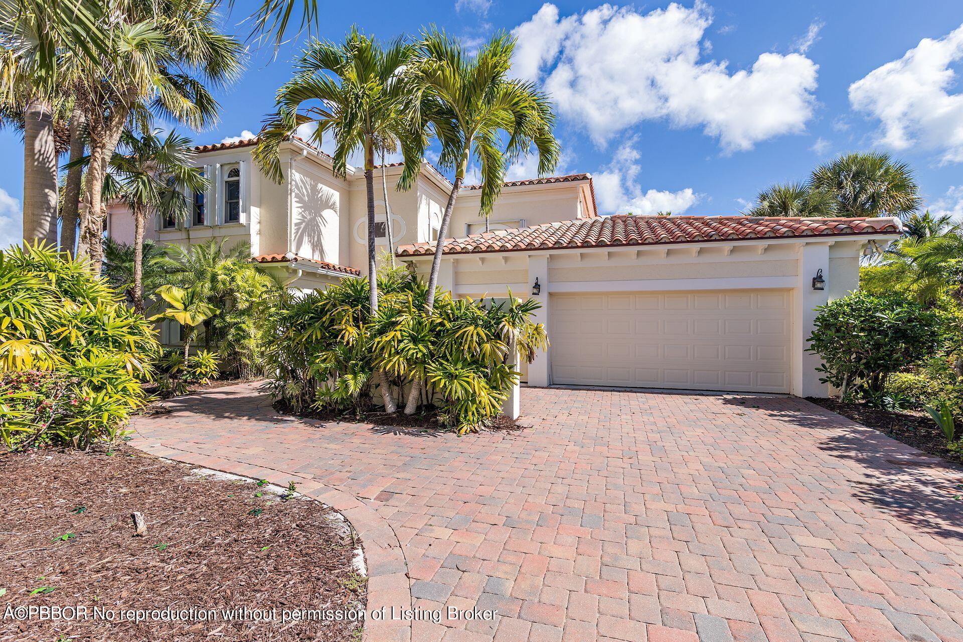 3299 Bridgegate Drive Jupiter, FL 33477 - Photo 3 of 48 a view of a garden with potted plants