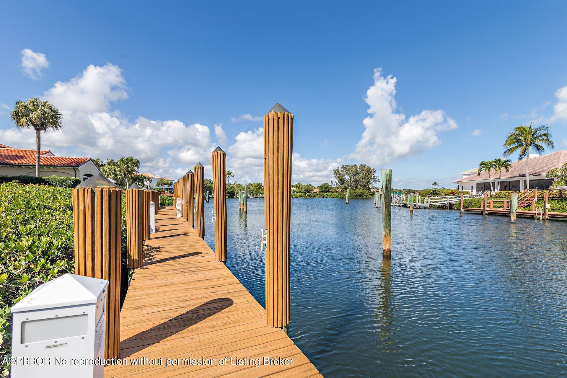 3299 Bridgegate Drive Jupiter, FL 33477 - Photo 35 of 48 a view of a balcony with dining table