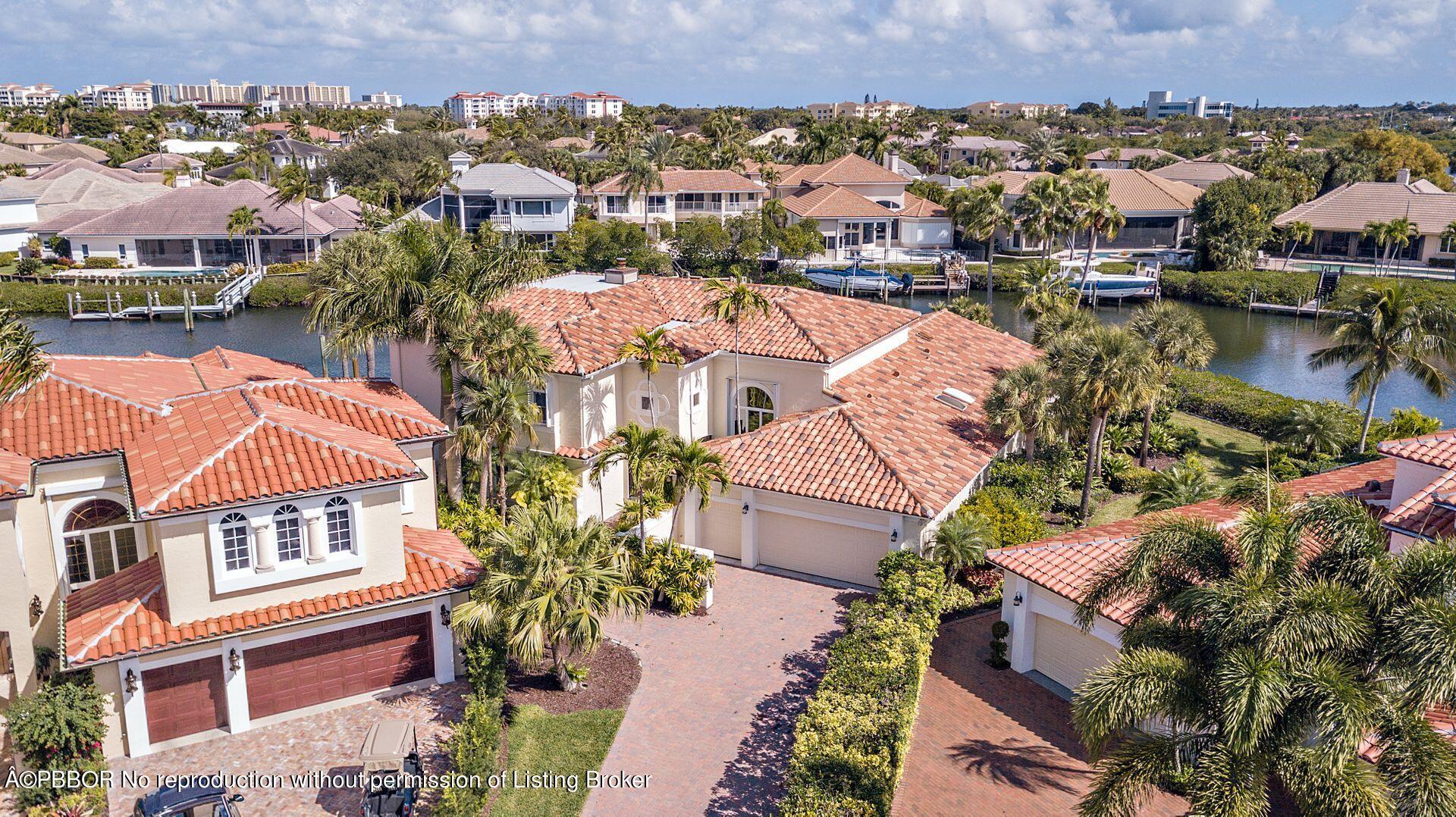 3299 Bridgegate Drive Jupiter, FL 33477 - Photo 37 of 48 an aerial view of multiple house
