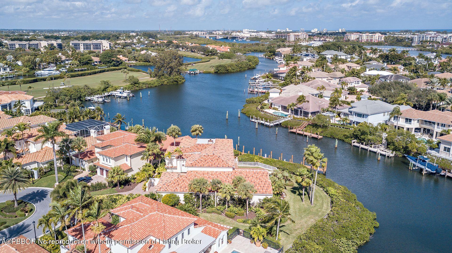 3299 Bridgegate Drive Jupiter, FL 33477 - Photo 40 of 48 an aerial view of residential houses with outdoor space