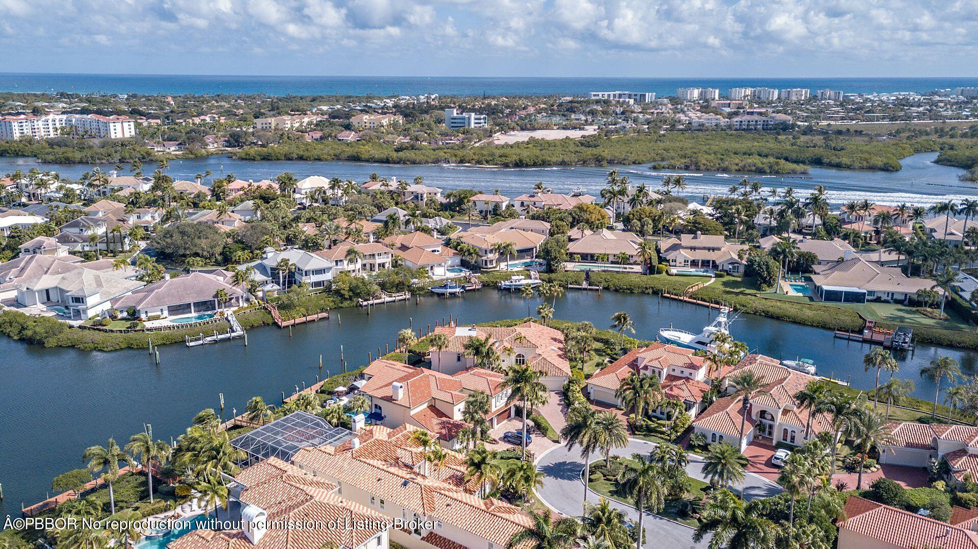 3299 Bridgegate Drive Jupiter, FL 33477 - Photo 44 of 48 an aerial view of a houses with outdoor space