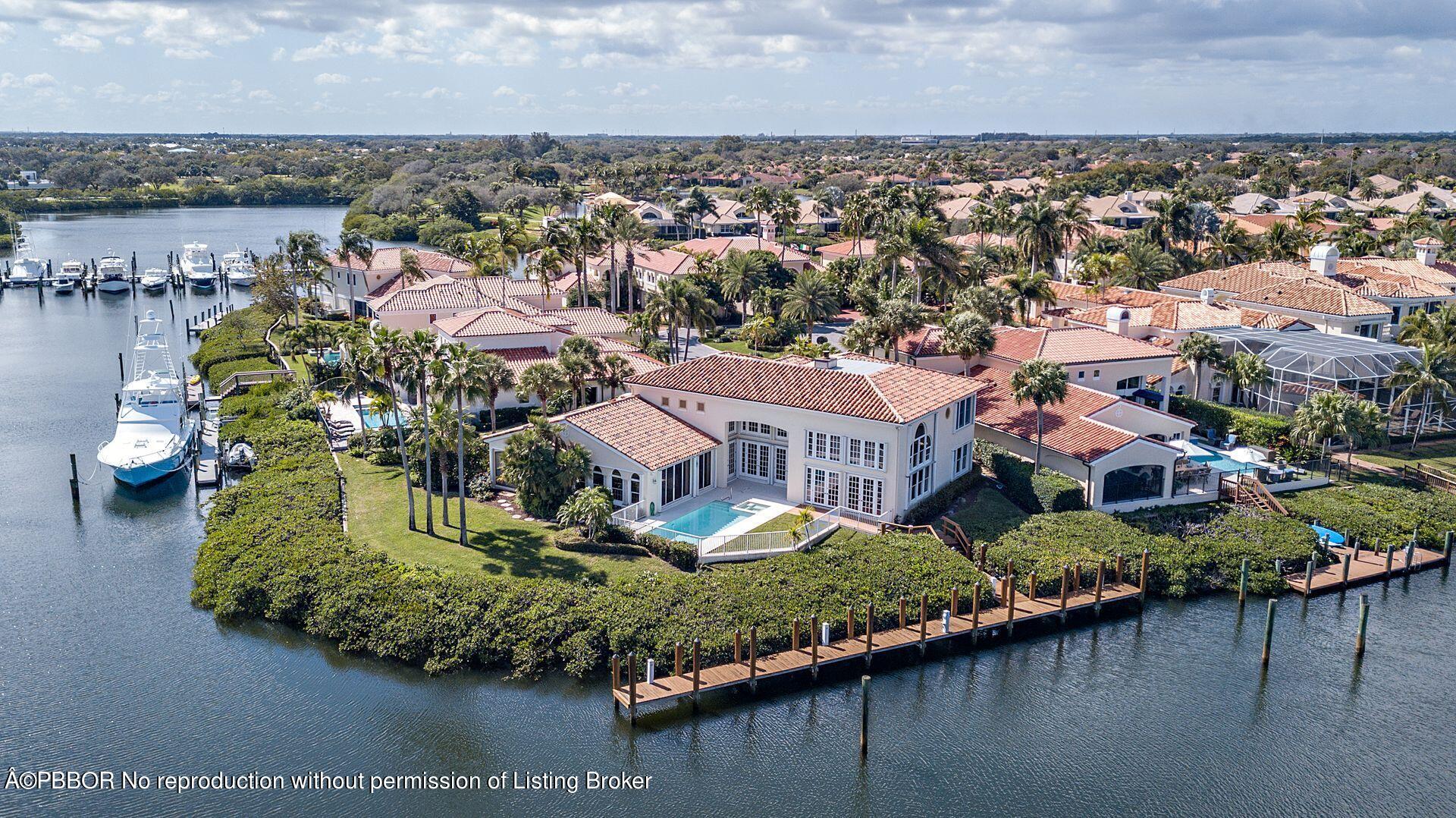 3299 Bridgegate Drive Jupiter, FL 33477 - Photo 46 of 48 an aerial view of residential houses with outdoor space and lake view