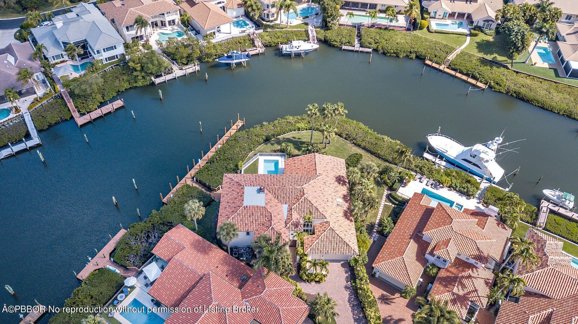 3299 Bridgegate Drive Jupiter, FL 33477 - Photo 48 of 48 an aerial view of a house with a lake view