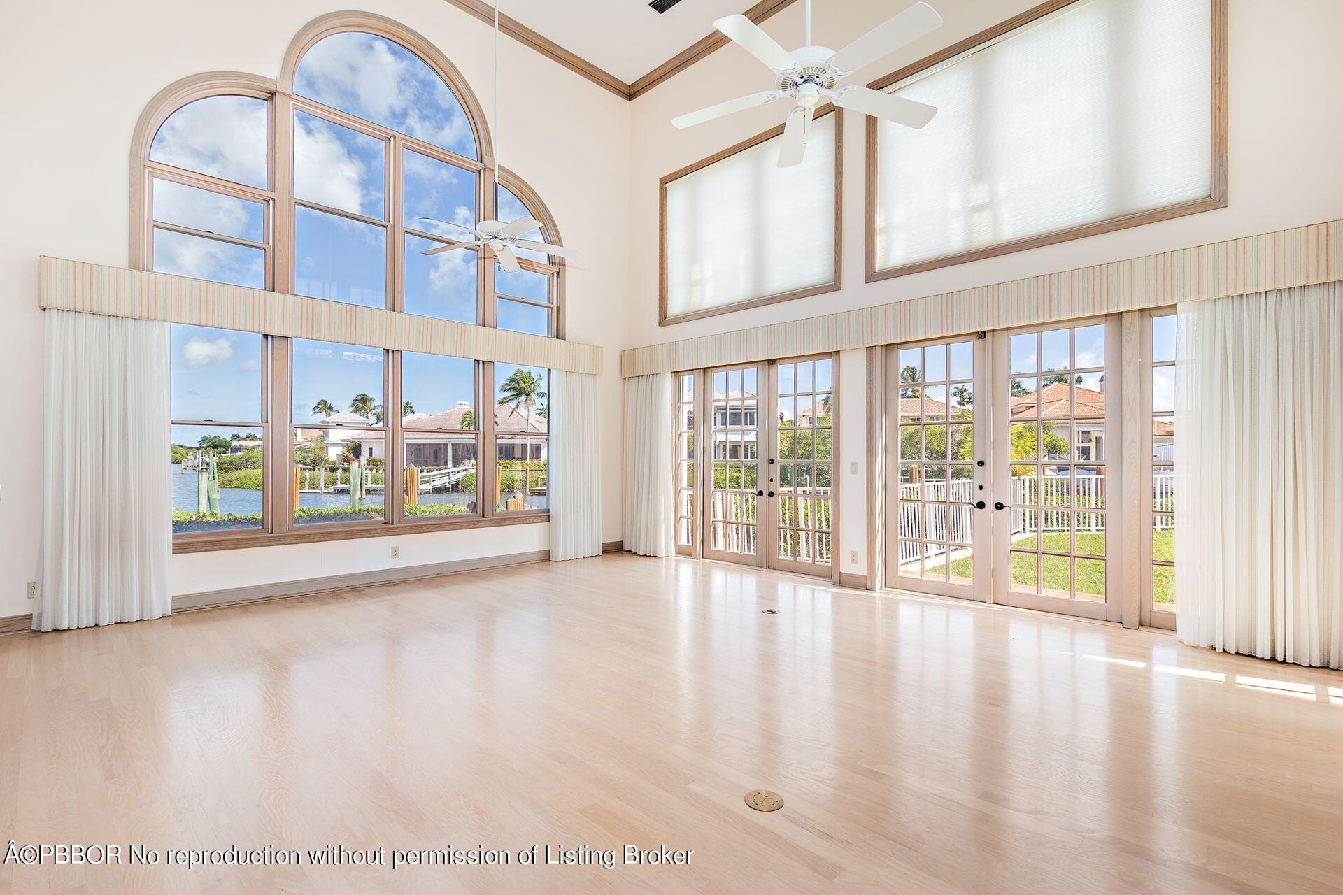 3299 Bridgegate Drive Jupiter, FL 33477 - Photo 8 of 48 a view of an entryway with wooden floor