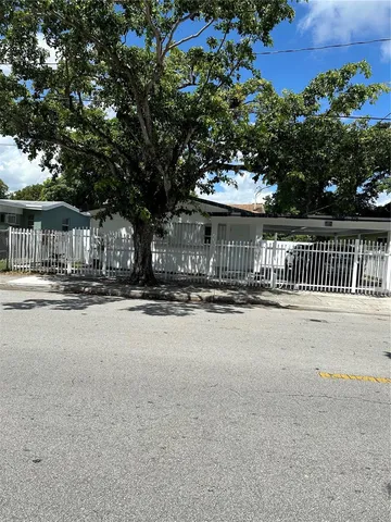 a view of street with large trees