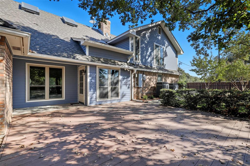 6140 Dick Price Road Fort Worth, TX 76140 - Photo 30 of 40 a front view of a house with a garden