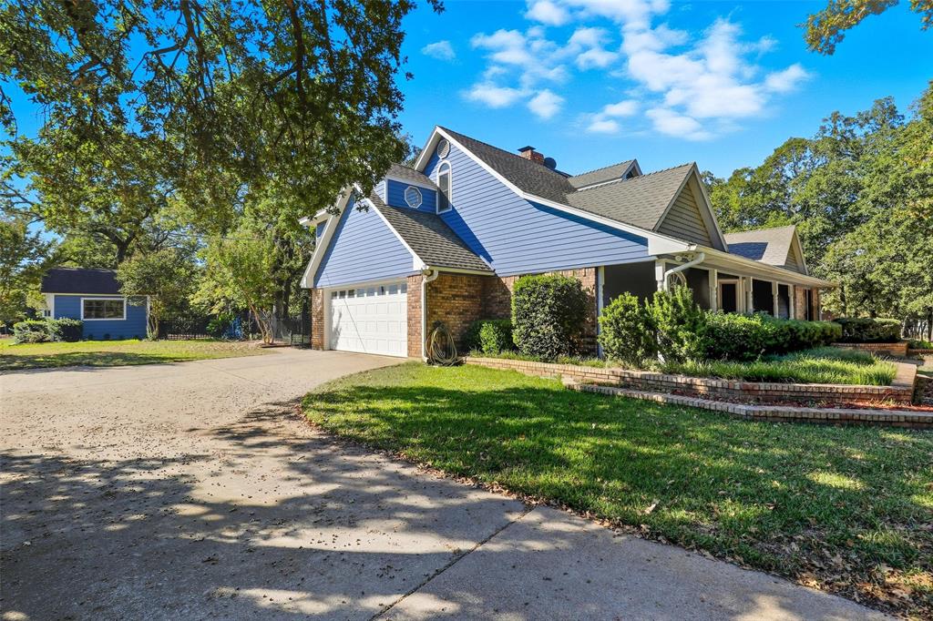 6140 Dick Price Road Fort Worth, TX 76140 - Photo 3 of 40 a house with swimming pool in front of it